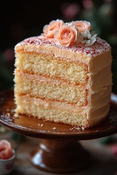 a piece of cake with frosting and flowers on top