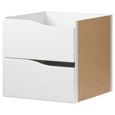 two white drawers with brown paper on top