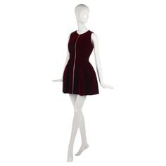 Azzedine Alaïa burgundy velvet dress from 1980s-1990s. Spectacularly structured mini dress with front-facing metal zipper. Formed into a tulip-like shape by top-stitched figure-hugging panels. A deep burgundy, wine red. Perfect for fall and winter, would look ravishing for holiday parties. Sumptuous fabric and in beautiful condition. Structured Mini Dress, Burgundy Cocktail Dress, Burgundy Velvet Dress, Azzedine Alaïa, Azzedine Alaia, Velvet Mini Dress, Designer Evening Dresses, Burgundy Velvet, Deep Burgundy