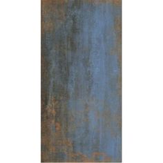 an old rusty metal plate with blue and brown paint on the outside, as well as rust