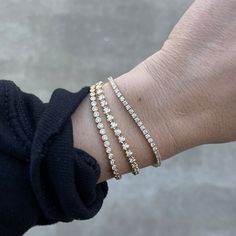 Elevate your outfit with the Cupcake Tennis Bracelet. Crafted from 14 karat gold and adorned with 3.18cttw of shimmering white diamonds, this piece is perfect for adding a classic, sophisticated touch to any wrist stack. Tennis Bracelet Outfit, Pepper Band, Bracelets Outfit, Wrist Stack, Wrist Stacks, Bezel Necklace, Bezel Diamond, Jewelry Inspo, Custom Engagement Ring