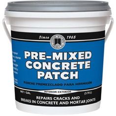 a bucket of pre - mixed concrete patch