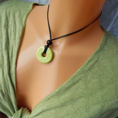 Hey island girl, get ready to channel your inner tropical goddess with this unique, handmade Tropical Lime Green Pendant Necklace. With its bold lime green iridescent glaze and intricate ceramic pendant, this vintage 90s piece is perfect for your summer beach days, island getaways, and nature adventures. Its rare and one-of-a-kind . I scored this baby while thrifting and knew I had to pass it on to a fellow tropical girl like you ! Please note that most of my shop is vintage or pre-loved, but I Adjustable Green Jewelry For Vacation, Casual Green Necklace For Vacation, Handmade Green Jewelry For Vacation, Casual Green Jewelry For Vacation, Handmade Lime Green Beach Jewelry, Tropical Necklace, Green Pendant Necklace, Tropical Girl, Green Pendant