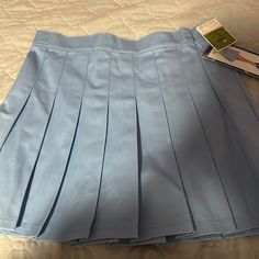 Brand New Pleated Blue Tennis Skirt Great Condition High Waist Light Blue Lined Skirt, Light Blue High Waist Lined Skirt, Blue Pleated Mini Tennis Skirt, Blue Mini Skort, Blue Pleated Skort Fitted, Blue Pleated Skirt For School In Spring, Casual Blue Pleated Tennis Skirt, Blue Pleated Fitted Skort, High Waist Light Blue Lined Mini Skirt