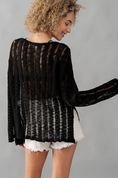 Introducing the Whispering Threads sheer distressed women's sweater! With its long sleeves and round neckline, this top offers a loose and comfortable fit. The see through lace adds a touch of delicate style, while the distressed details give it a unique edge. Perfect for those who love to make a statement with their fashion choices! Gorgeously soft with stretch. 100% Acrylic. Model is wearing a size small. She is 5'8". See size chart for sizing info. Sheer Long Sleeve Sweater For Spring, Spring Hollow Out Crew Neck Sweater, Spring Long Sleeve Hollow Out Sweater, Spring Crew Neck Sweater With Hollow Out Design, Sheer Long Sleeve Sweater For Fall, Long Sleeve Open Knit Top For Layering, Trendy Open Knit Crew Neck Cardigan, Fashion Knitwear, Distressed Sweater