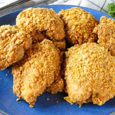 some fried food is on a blue plate