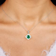 Product Details Be Dazzle with this Beautiful Flower Pendant embellished with Round Shape Created Emerald set in a Half Bezel Setting along with a Zircon Halo. Product Information SKU SHP-PENDANT0621102985 Length 19.5 mm Width 13.5 mm Weight 3.60 gm (Approximate) LAB CREATED EMERALD INFORMATION No.of Stones 1 Pieces Total Weight 2.18 Carat (Approximate) Dimension(approx) Round-8X8 mm-1 Pcs Color Green Cut Brilliant Shape Round Setting Type Half-Bezel-Setting Quality Grade AAAA ZIRCON INFORMATION Half Bezel Setting, Emerald Set, Floral Pendant Necklace, Half Bezel, Lab Created Emerald, Emerald Pendant, Floral Pendant, Flower Pendant, Beautiful Flower