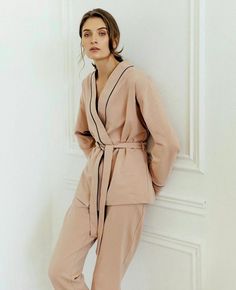 These natural pajamas are made of soft cotton knitwear fabric (jersey) and are perfect for sleep, parties, or everyday use. Our luxurious, temperature-regulating knit fabric drapes and falls in all the right ways, enveloping the body in comfort. Plus, it's machine washable and gentle on the skin, so it not only feels beautiful but it's easy to care for, too. These are the cozy, relaxed PJs you'll live in, a gift to everyone, and pack with you wherever you go. Composition: 95% cotton, 5% elastin (it helps to be like a second skin because of stretching features) We could advise more colors for this set: black, beige, white, dark blue, and light pink. Please, write to me, if you want to change the color. The set includes a long sleeve kimono and matching pajama pants. With pockets. We suggest Cotton V-neck Lounging Sets, Cotton V-neck Sleepwear For Pajama Party, Cotton V-neck Sleepwear For Loungewear, Cotton Lounging V-neck Sets, Cotton Lounging Sets With V-neck, Beige Long Sleeve Sleepwear For Pajama Party, Beige Long Sleeve Bedtime Sets, Beige Long Sleeve Sleepwear Set, Beige Long Sleeve Sleep Set