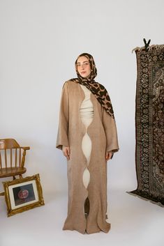 From running to the mosque, to celebrating Eid and #abayaFridays, our flowing abayas add just what you need to elevate any look. Dimensional texture and a curving detail gives this abaya a unique touch you won’t find anywhere else. Now in a timeless tan with gold undertones. Complete the look with our black or beige layering dress or rock it alone. Pairs with Moonrise Oak Mariam M/L 5’7 Tall (was wearing 2 inch kitten heels) Sarah 5’4 M/L Standard (was wearing flats) Wafaa 5’1 XS/S Short (was we Mosque Outfit, Hijab Colors, Abaya Black, Grey Sweats, Instant Hijab, Layer Dress, Abaya Fashion, Silk Chiffon, Pretty Colours