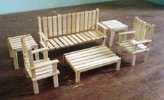 miniature wooden furniture sitting on top of a hard wood floor