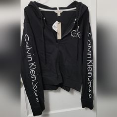 Calvin Klein Zip Up Hoodie. Nwt. Medium Weight. Super Cute! Calvin Klein Cotton Hoodie With Long Sleeves, Calvin Klein Cotton Hoodie For Fall, Calvin Klein Fall Sweatshirt For Streetwear, Calvin Klein Hoodie Sweatshirt For Fall, Calvin Klein Cotton Long Sleeve Hoodie, Calvin Klein Long Sleeve Cotton Hoodie, Calvin Klein Hoodie With Drawstring Hood For Winter, Calvin Klein Hooded Sweatshirt For Fall, Calvin Klein Hooded Sweatshirt For Winter