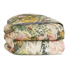 three floral sheets stacked on top of each other