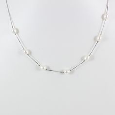 "LarkKing LK10043 Sterling silver pearl chain necklace , 7 PCs nature freshwater pearl necklace, pearl choker necklace, bridesmaid necklace, bridal necklace, pearl necklace for women, pearl necklace for gift. Materials: White gold plated solid 925 sterling silver, 7 PCs freshwater pearls (oval shape, nature color) Necklace pendant: 7 PCs nature freshwater pearls. Pearl Sizes: 5 PCs of 5.5 mm x 7.5mm , 2 PC of 5.5 mm x 6.2 mm, pearl sizes are slightly different Necklace chain: 16\" white gold pla Ursula Necklace, Bridal Necklace Pearl, Wanderlust Jewelry, Pearl Chain Necklace, Vintage Jewelry Sets, School Jewelry, Silver Pearl Necklace, Best Friend Necklaces, Necklace Bridal