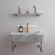 a marble table with two shelves above it