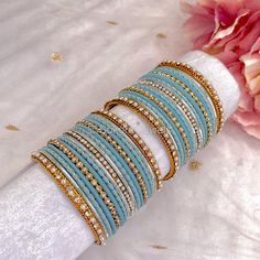 2 small half stacks of antique Gold bangles with light blue. Ready to Ship! Packed loose in small gift box. (No roll) Antique Gold Bangles, Bridal Survival Kit, Blue Bangles, Bangle Box, Hand Harness, Colorful Bangles, Gold Bangle Set, Bridal Choker, Bridal Necklace Set