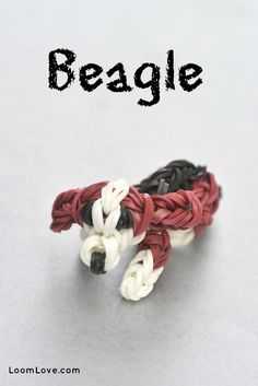 two bracelets with the words beagle written in black, white and red on them