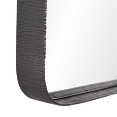 a close up of a mirror on a white background with black lines and an edge