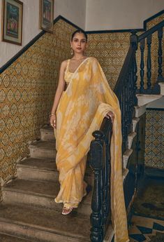 Embrace the warmth of the sun with the Marisol Saree, a radiant piece crafted in bright yellow linen. This saree captures the essence of joy and light, with its soft, breathable fabric draping effortlessly around you. Whether you're attending a daytime event or simply celebrating the beauty of life, this saree is a celebration of sunshine and grace, wrapping you in its cheerful embrace. MODEL DETAILS Model Name- Raghvi Sehgal Bust- 32.5 Arms- 10.9 Hips-37 Height - 5.6 Fabric: 100% Linen Characte Fabric Draping, The Beauty Of Life, Beauty Of Life, Linen Saree, Yellow Print, Bright Yellow, Clothing Items, Breathable Fabric, Art Collection