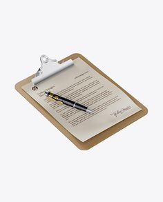 a clipboard with a pen and paper on it