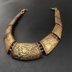 Fine example of Tibetan carving of Ashtamangala necklace in antique brass finish  Approximate length is 18-20 inches , Approximately 1.5 inches wide The Ashtamangala is a sacred suite of Eight Auspicious Signs endemic to a number of religions such as Hinduism, Jainism, and Buddhism Brass Necklace For Diwali Festival, Brass Necklaces For Diwali Festival, Brass Necklace For Festive Diwali Occasion, Festive Brass Temple Jewelry Necklaces, Metal Necklaces For Diwali Festival, Festive Temple Style Brass Bridal Necklace, Gold Oxidized Finish Jewelry For Festive Occasions, Gold Oxidized Jewelry For Festive Occasions, Gold Jewelry With Oxidized Finish For Festive Occasions