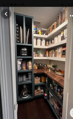 an open pantry with lots of food in it