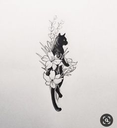 a black cat sitting on top of a white wall with flowers in it's paws