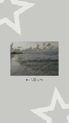 an image of the beach with waves coming in from the water and some clouds above it