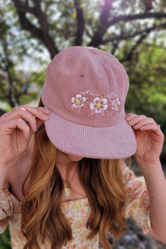 Flatbill Corduroy hat with Floral Mountain design embroidered onto the front panels. Snapback. Mauve Corduroy panels. Corduroy Hat, Mountain Design, Mountain Designs, Mountain Range