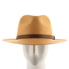 ↑ Click above to watch the video! ↑ Malta Sienna is a modern fedora with a tall hand-blocked teardrop crown that features a stiffened medium brim, sleek leather strap hatband, and beautiful sienna-colored straw. The brim contains a wire to hold its shape. This item is a genuine Panama Hat handwoven in Ecuador. Material: 100% Toquilla StrawBrim: 2 3/4"Crown: 4 1/2" teardropHatband: 5/8" leatherClimate: Sun Handwoven in Ecuador. Hand-finished in the US. Measurements are approximate, this is a hand Adjustable Leather Fedora With Short Brim, Classic Leather Fedora With Flat Brim, Classic Leather Fedora With Curved Brim, Modern Adjustable Hats For Everyday Wear, Modern Adjustable Hats For Everyday, Modern Adjustable Hat For Everyday, Elegant Brown Hat Band For Everyday, Classic Wide Brim Fedora For Everyday, Wide Brim Leather Fedora For Formal Occasions