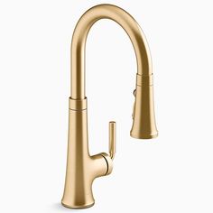 an image of a kitchen faucet with gold finish on the side and white background