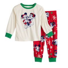 Your Disney-loving dudes and dudettes will adore the magical charm of these Mickey Mouse and Minnie Mouse family pajamas by Jammies For Your Families.Your Disney-loving dudes and dudettes will adore the magical charm of these Mickey Mouse and Minnie Mouse family pajamas by Jammies For Your Families.FEATURES 2-piece set includes: top & bottoms Top: crewneck, long sleeves Bottoms: elastic waistbandFABRIC & CARE Polyester For children's safety the garments should be snug fitting or flame resistant. Disney Christmas Pjs Family, Family Christmas Pajamas Disney, Disney Cotton Sets For Pajama Party, Disney Pjs Personalized Gap, Mickey Mouse And Minnie Mouse, Toddler Top, Christmas Jammies, Disney Pajamas Kids Size 12, Family Pajamas