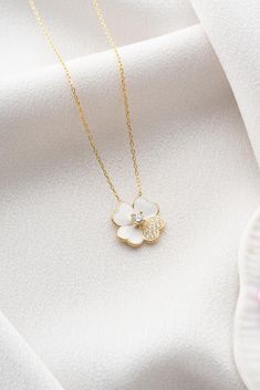 Pure White Clover Necklace, 925 Sterling Silver,  Four Leaf Clover Pendant, Tiny Floral  Necklace, Lucky Clover Pendant, Irish Shamrock Charm, Heart Clover Charm, Anniversary Gifts, Perfect Gift for Her 🍀✨ In the purity of white clover, grace and luck intertwine, where the pristine petals hold the secret to a world blanketed in the elegance of white. 🍀✨ Materials: High Quality 925 Sterling Silver * Zircon Stone * Rose Gold Plating Chain: 925 Sterling Silver Chain is included in price. Chain Length: 17 inches (42 cm) Pendant width: 0.55 inches (1.40cm) Pendant height: 0.55 inches (1.40cm) ✔️ FREE & Express SHIPPING to the US, Canada, UK and EU countries. ✔️ All your orders are shipped with a valid tracking code. ✔️ Premium Packaging with all orders ready to gift ✅ Care Instructions: You s White Clover, Luck Necklace, Symbol Of Luck, Art Nouveau Pendant, Clover Pendant, Irish Shamrock, Stone Rose, Clover Charm, Premium Packaging