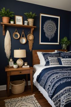 a bedroom with dark blue walls and white bedding