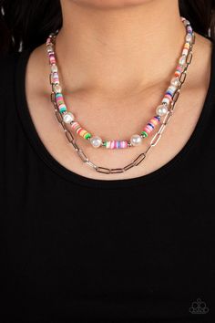 Sections of colorful rubber discs in rainbow shades are separated by tiny silver beads and a variety of white baroque pearls to create an unexpected mashup of texture along the collar. A strand of silver paperclip link chain is paired with the abstract design in a layered finish. Features an adjustable clasp closure.   Sold as one individual necklace. Includes one pair of matching earrings. Multi Necklace, Happy Jewelry, Paparazzi Accessories, Blue Necklace, Paparazzi Jewelry, Kids Jewelry, Baroque Pearls, Pendant Earrings, Accessories Necklace