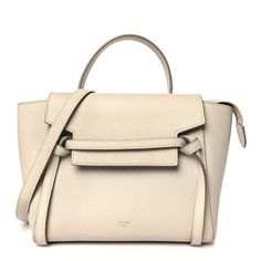 This is an authentic CELINE Grained Calfskin Micro Belt Bag in Dune. This chic tote is crafted of richly textured light beige calfskin leather with a structured and spacious silhouette. The bag features a leather handle, optional shoulder strap, and polished brass hardware. The facing flap opens to a matching suede interior with hanging patch pockets. Celine Belt Bag, Bag Light, Work Bags, Black Cross Body Bag, Brass Hardware, Light Beige, Polished Brass, Leather Handle, Belt Bag