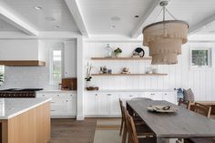 the kitchen is clean and ready to be used as a dining room or family room