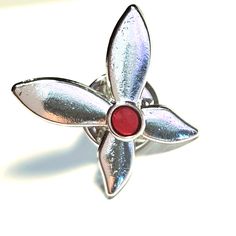 Miraculous Butterfly Brooch. This Silver Butterfly Brooch Represents The One Monarch Wears In Miraculous: Tales Of Ladybug And Cat Noir. Silver With A Red Jewel In The Center. 1" Tall This Will Make An Awesome Gift For Any Miraculous Fan! Pair It With Other Miraculouses I Have Listed. Miraculous Jewelry Miraculous Butterfly, Miraculous Jewelry, Butterfly Miraculous, Jewelry Butterfly, Red Jewel, Butterfly Brooch, Silver Butterfly, Ladybug And Cat Noir, Hand Crafted Jewelry