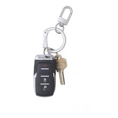 a car keychain that is attached to a metal chain with two keys in it