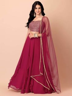 Introducing our gorgeous pink georgette reception wear lehenga choli with dupatta, the perfect ensemble for weddings, functions like sangeet, receptions, and parties. This exquisite outfit is designed to make you look and feel stunning on any special occasion.
The lehenga is crafted from high-quality georgette material in a beautiful pink color. Its semi-stitched design can be adjusted up to 42 inches, ensuring a perfect fit for most body types. With a 3.50-meter flair, this lehenga creates a gr Pink Georgette Lehenga, Gold Lehenga, Georgette Material, Pink Color Combination, Function Dresses, Lehenga Designs Simple, Half Saree Designs, Lehenga Choli Online, Pink Lehenga