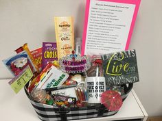 a basket filled with lots of different types of candy and candies on top of a table