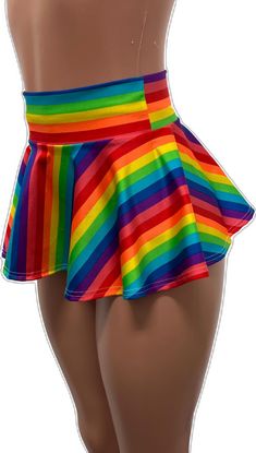 Spring Multicolor Stretch Swim Skirt, Fitted Multicolor Skirted Bottoms, Multicolor Stretch Skirted Skort, Fitted Multicolor Skirted Skort, Fitted Rave Skirt For Spring, Fitted Rave Mini Skirt For Spring, Spring Fitted Rave Skirt, Spring Rave Fitted Skirt, Fitted Multicolor Bottoms For Pride