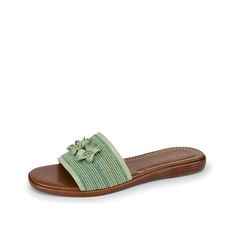 Italian Shoemakers-Ivanna Sandal Add some bloom to your step with the Ivanna sandal from Italian Shoemakers. This slide sandal features contrast, patterned strap with floral appliques for a beautiful touch. Green Flat Sandals With Woven Sole, Spring Green Sandals With Woven Sole, Green Open Toe Sandals With Woven Sole, Green Sandals With Woven Sole For Beach, Green Slide Sandals For Spring, Spring Open Toe Slippers With Woven Sole, Green Slide Sandals For Vacation, Green Flip Flops With Removable Insole For Vacation, Adjustable Green Slides For Vacation