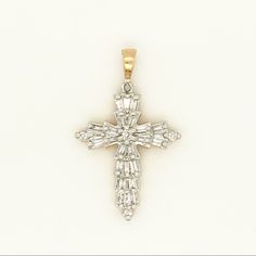 Baguette Cross 14k Yellow Gold, Weighs 1.4 Grams, It Has A 0.18 Carat Total Weight In The Diamonds (Chain Is Not Included) Timeless White Baguette Jewelry, Elegant Cross Shaped Jewelry With Baguette Diamonds, Elegant Cross Jewelry With Baguette Diamonds, Timeless White Baguette Diamond Jewelry, Timeless White Jewelry With Baguette Diamonds, White Baguette Fine Jewelry, White Baguette Diamond Pendant Jewelry, White Baguette Jewelry For Gift, Diamond Cross Necklace