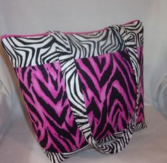 "Designs by Keri® This is a fun colorful Zebra bag! Add a name at the top to make it extra special! Add name no charge! PERSONALIZE: EMAIL ME AFTER PURCHASE WITH DETAILS Large 13\" tall x 17\" wide x 5\" deep with 31\" handles This Colorful tote is made with a black and white wild zebra print for the top, bottom and handles then I jused a coordinating hot pink and black zebra print for the center of the bag. I used a hot pink zipper. The bag is fully lined and there are 6 interior pockets with e Zebra Bag, Hot Pink Decor, Hot Pink Zebra, Diaper Bag Tote, White Zebra, Ribbon Design, Pink Zebra, Pink Decor, Handbag Purse