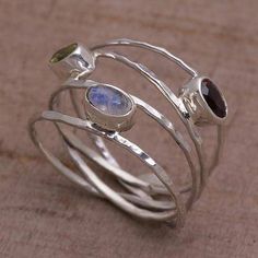 Unique Multigemstone Sterling Silver Ring from Bali - Brilliant Majesty | NOVICA Multi Band Ring, Paw Print Jewelry, Multi Gemstone Ring, Ribbon Jewelry, Fair Trade Jewelry, Sparkly Things, Printed Jewelry, Hammered Sterling Silver, Toe Rings