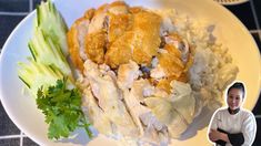 a white plate topped with chicken and rice next to celery sticks on top of a table