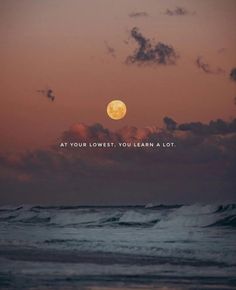 the moon is setting over the ocean and it says at your lowest, you learn a lot