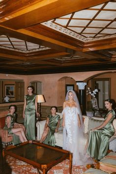 a bride and her bridal party in the living room