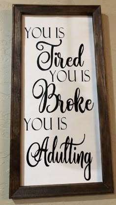 a framed sign that says you're tired if you broke your adulting