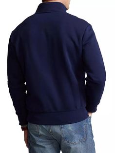 The iconic Polo Sport logo adorns the front of this streamlined quarter-zip fleece pullover..Stand collar.Long sleeves.Quarter-zip placket.Ribbed cuffs and hem.Cotton/polyester.Machine wash.Imported.SIZE & FIT.About 27.5' from shoulder to hem.ABOUT THE BRAND.Synonymous with Americana style since 1967, Ralph Lauren started with one item—the necktie—under the name Polo. The house has since stood for the epitome of refined dressing for men. From collegiate sweaters and polos to evening-ready suiting and tailored coats, there's a timeless piece for every occasion..The iconic Polo Sport logo adorns the front of this streamlined quarter-zip fleece pullover.Stand collarLong sleevesQuarter-zip placketRibbed cuffs and hemCotton/polyesterMachine washImportedSIZE & FITAbout 27.5” from shoulder to hem Navy Half-zip Sweatshirt For Fall, Sporty Long Sleeve Sweater With Zipper Closure, Long Sleeve Fleece Hoodie With Ribbed Collar, Fleece Sweatshirt With Zipper Closure And Long Sleeves, Long Sleeve Fleece Sweatshirt With Zipper Closure, Navy Long Sleeve Sweatshirt With Ribbed Collar, Solid Fleece Track Jacket With Long Sleeves, Navy Long-sleeve Sweatshirt With Ribbed Collar, Solid Fleece Long Sleeve Track Jacket